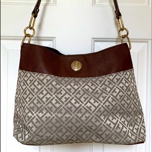 Tan patterned woman’s bag